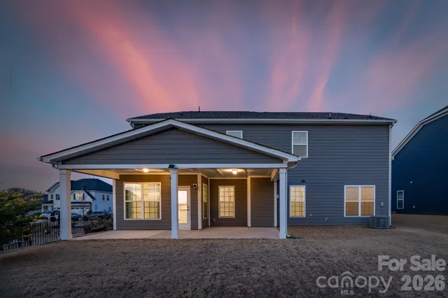 a front view of a house with a porch