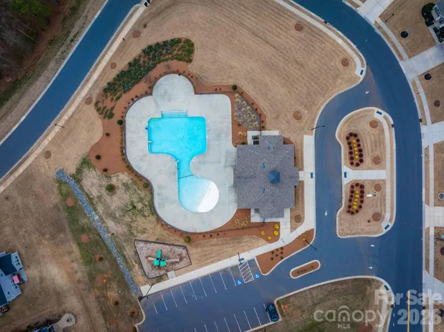 an aerial view of a swimming pool