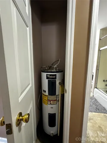 a kitchen with a refrigerator and stove