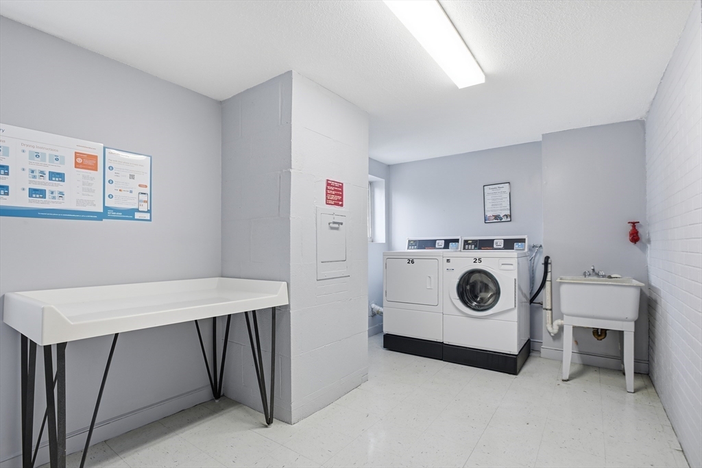 68 Main Street, Unit 36C Stoneham, MA 02180 - Photo 16 of 19 a utility room with dryer and washer