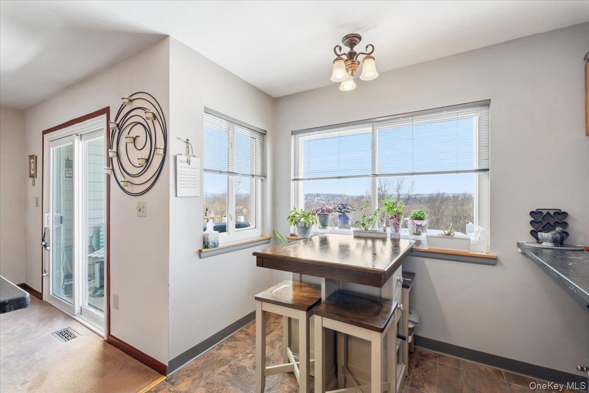 1707 Eagles Ridge Road Brewster, NY 10509 - Photo 15 of 50 a view of a workspace with furniture and a window