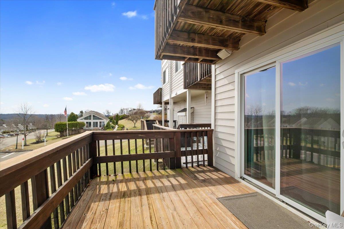 1707 Eagles Ridge Road Brewster, NY 10509 - Photo 39 of 50 a view of a balcony with wooden floor