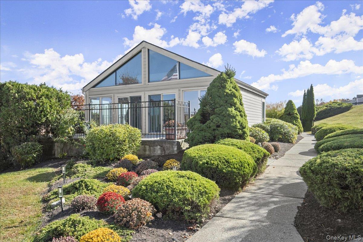 1707 Eagles Ridge Road Brewster, NY 10509 - Photo 46 of 50 a front view of house with lot of plants