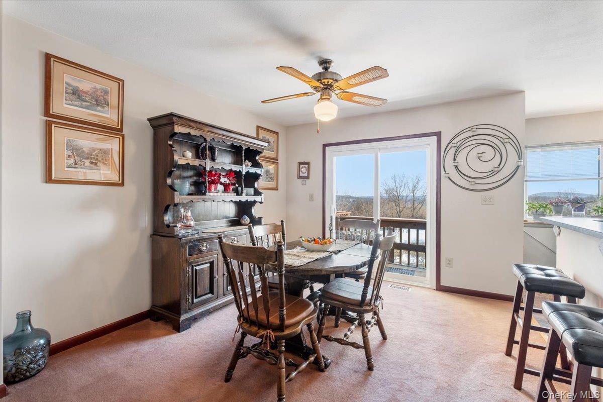 1707 Eagles Ridge Road Brewster, NY 10509 - Photo 8 of 50 a view of a dining room with furniture and window
