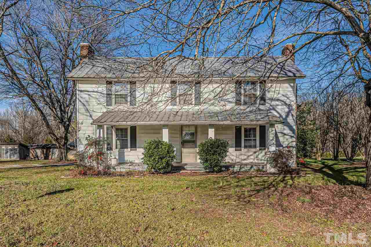 420 County Line Road Timberlake, NC 27583 - Photo 1 of 30 a front view of a house with garden
