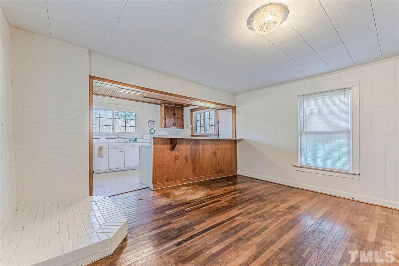 420 County Line Road Timberlake, NC 27583 - Photo 15 of 30 an empty room with windows and cabinet