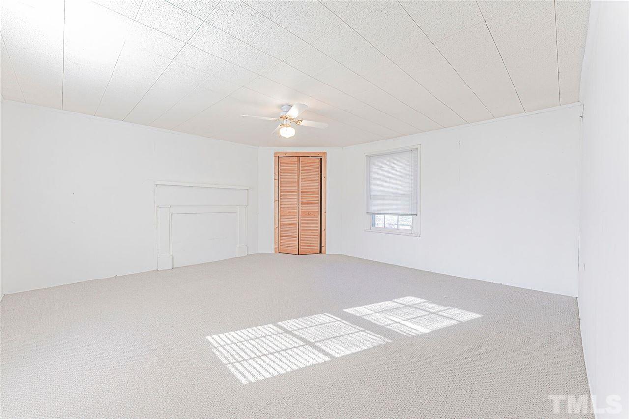 420 County Line Road Timberlake, NC 27583 - Photo 22 of 30 an empty room with windows