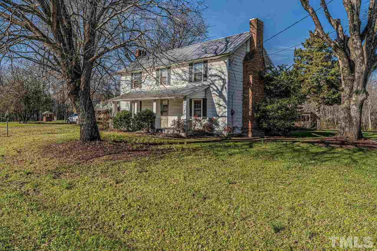 420 County Line Road Timberlake, NC 27583 - Photo 28 of 30 a front view of a house with garden