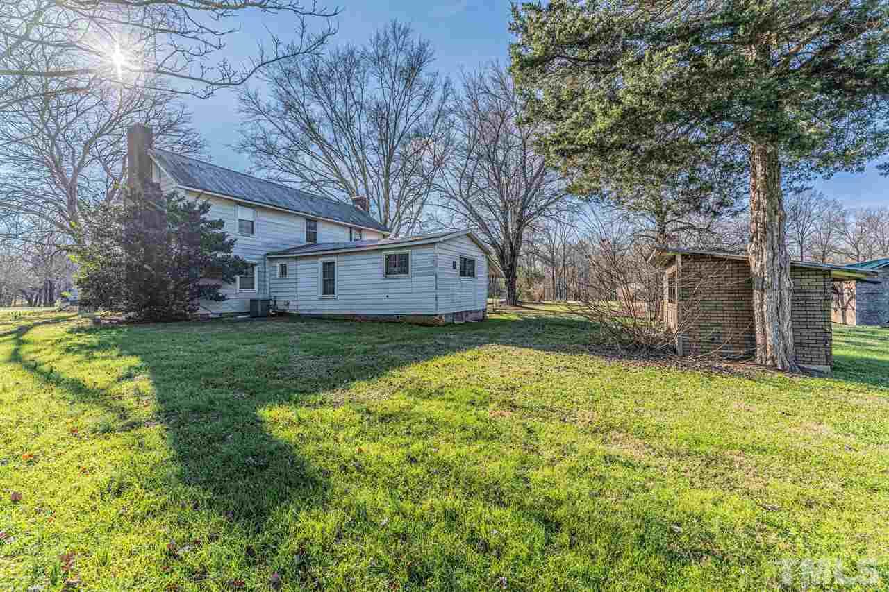 420 County Line Road Timberlake, NC 27583 - Photo 30 of 30 a view of a house with a yard