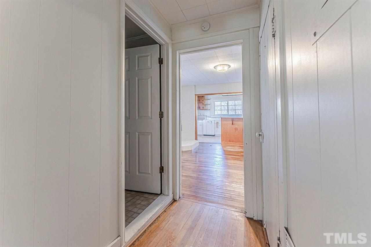 420 County Line Road Timberlake, NC 27583 - Photo 10 of 30 a view of a hallway with wooden floor