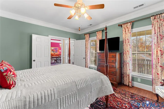 a bath room with a bath tub and a shower