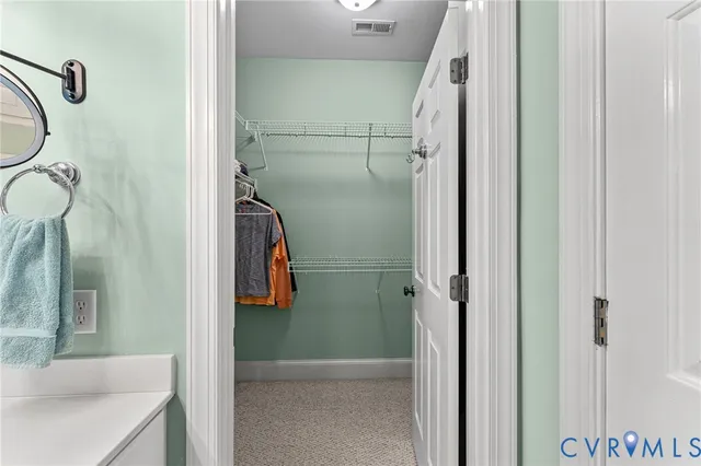 a living room with furniture fireplace and flat screen tv