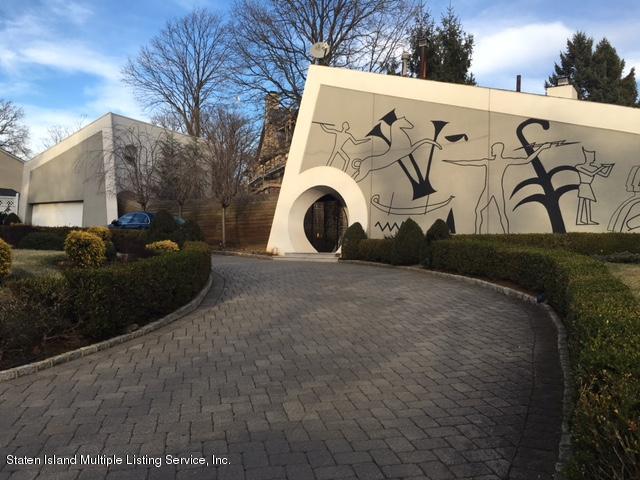 775 Todt Hill Road Staten Island, NY 10304 - Photo 1 of 4 a view of a car park in front of house