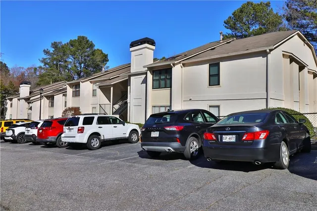 a view of a car in front of a house