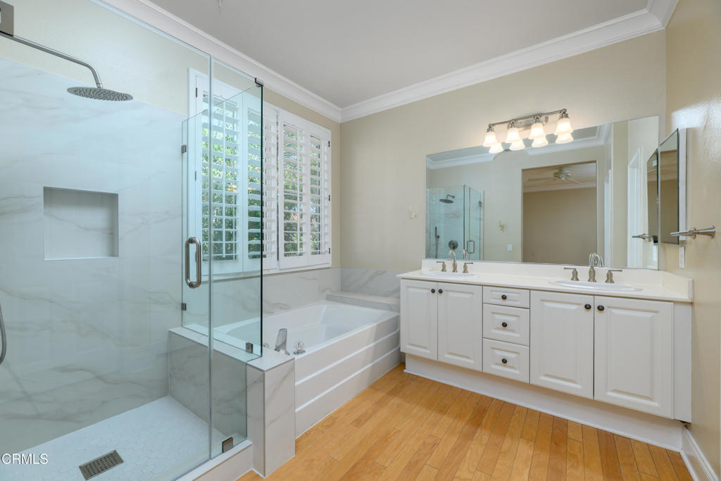 353 Via Cantilena Camarillo, CA 93012 - Photo 29 of 42 a bathroom with a tub sink and mirror