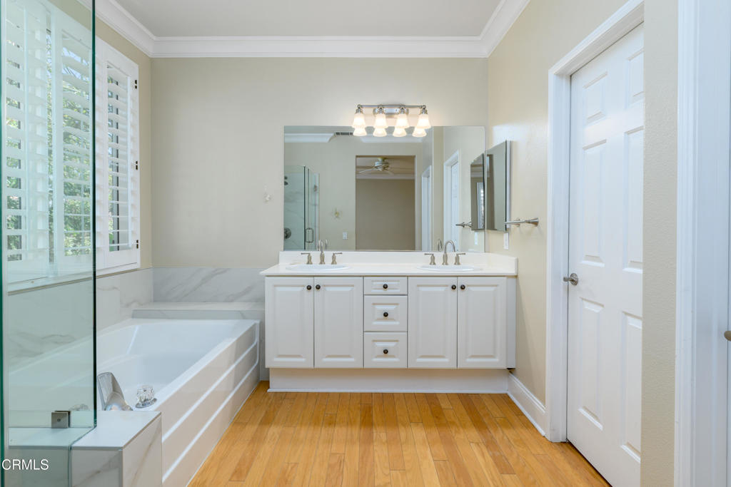 353 Via Cantilena Camarillo, CA 93012 - Photo 31 of 42 a bathroom with a tub sink and mirror