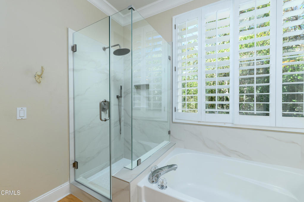 353 Via Cantilena Camarillo, CA 93012 - Photo 32 of 42 a white bath tub sitting next to a shower
