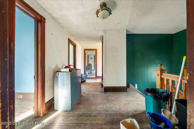 a view of an empty room and window