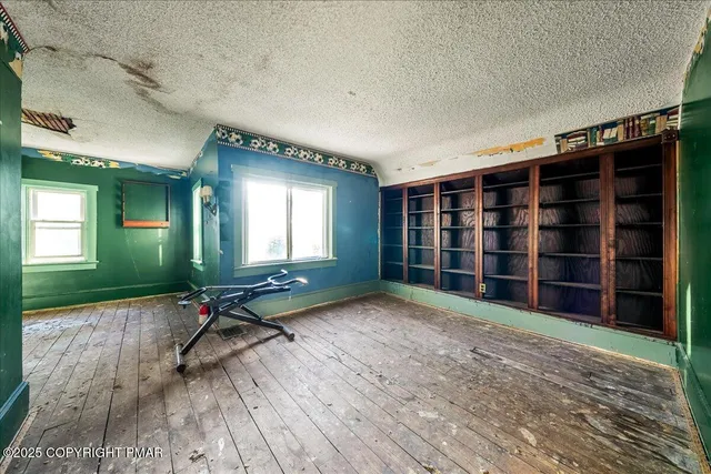 an empty room with window