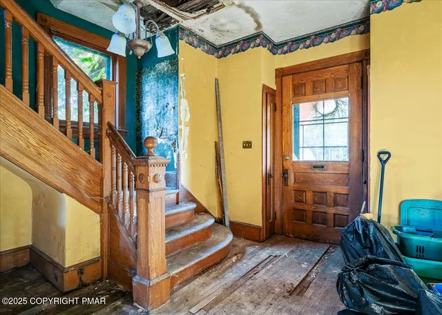 a view of an entryway with staircase