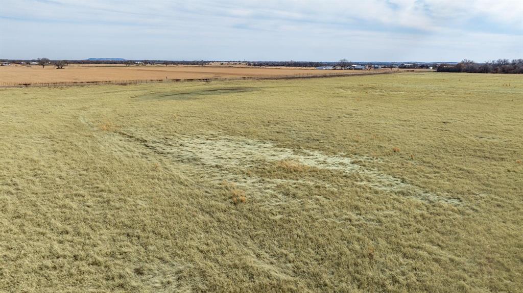 2826 Campbell Road Tolar, TX 76476 - Photo 4 of 21 a view of an ocean and beach