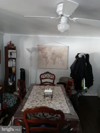 a bedroom with a bed and dresser