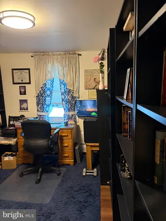 a view of a workspace with furniture