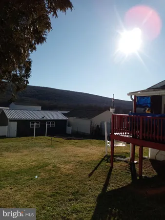 a view of a chairs and table on the terrace