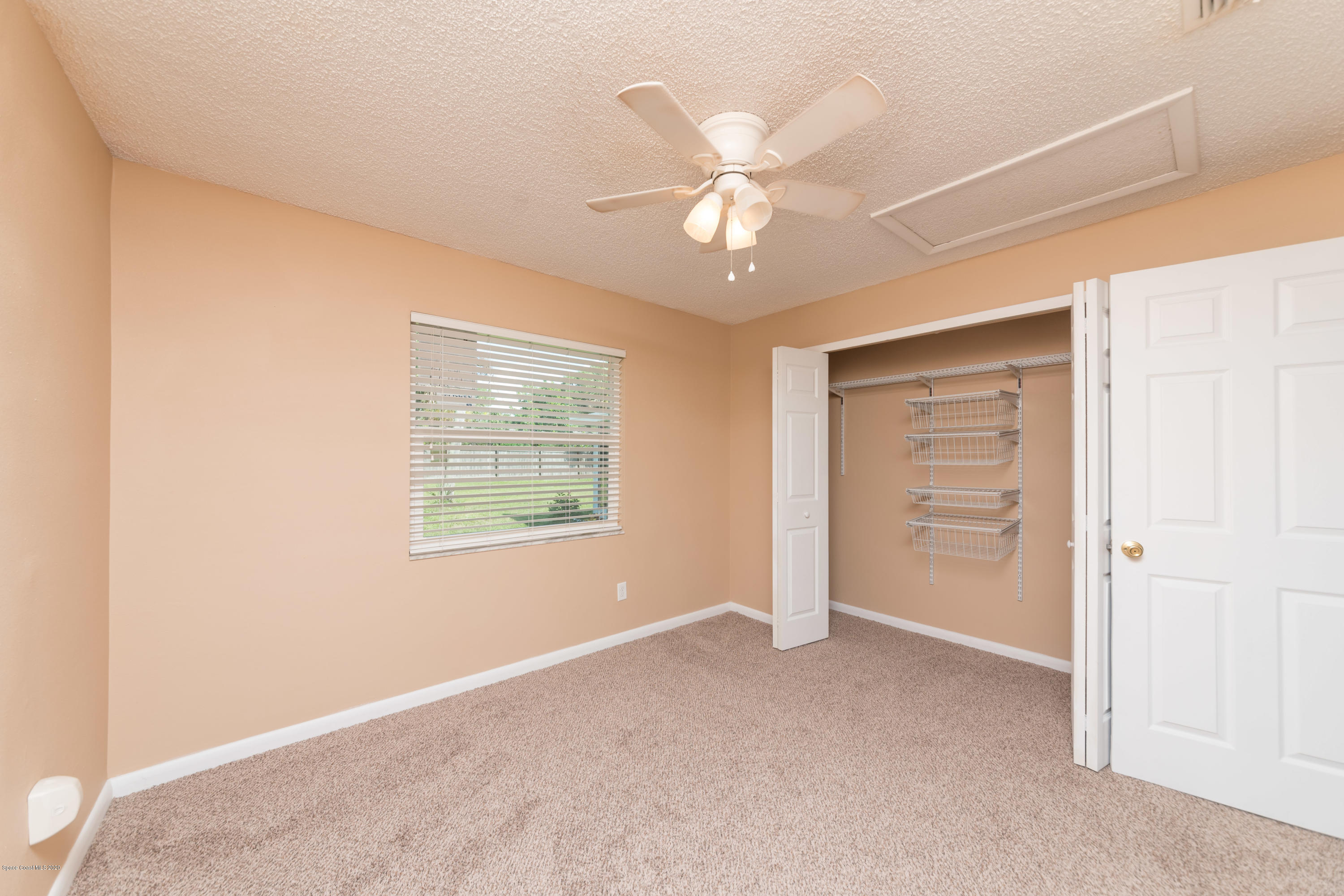 5390 Carrick Road Cocoa, FL 32927 - Photo 20 of 28 Bedroom 3 View 3 - Showcase Closet Syste