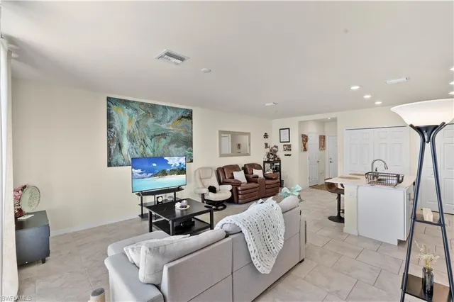 a bathroom with a sink a mirror and toilet