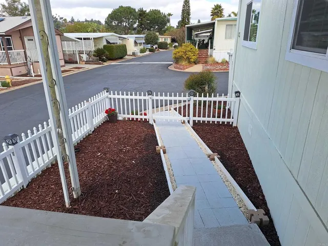 a view of a balcony with chair