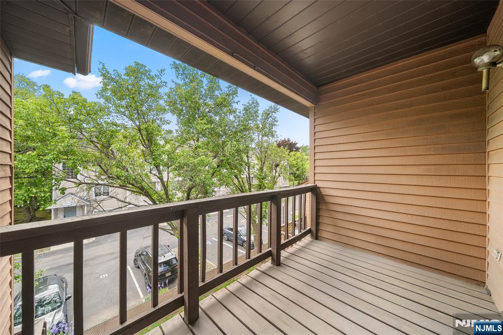 140 Allwood Road, Unit C Clifton, NJ 07012 - Photo 28 of 31 a view of a balcony with wooden floor