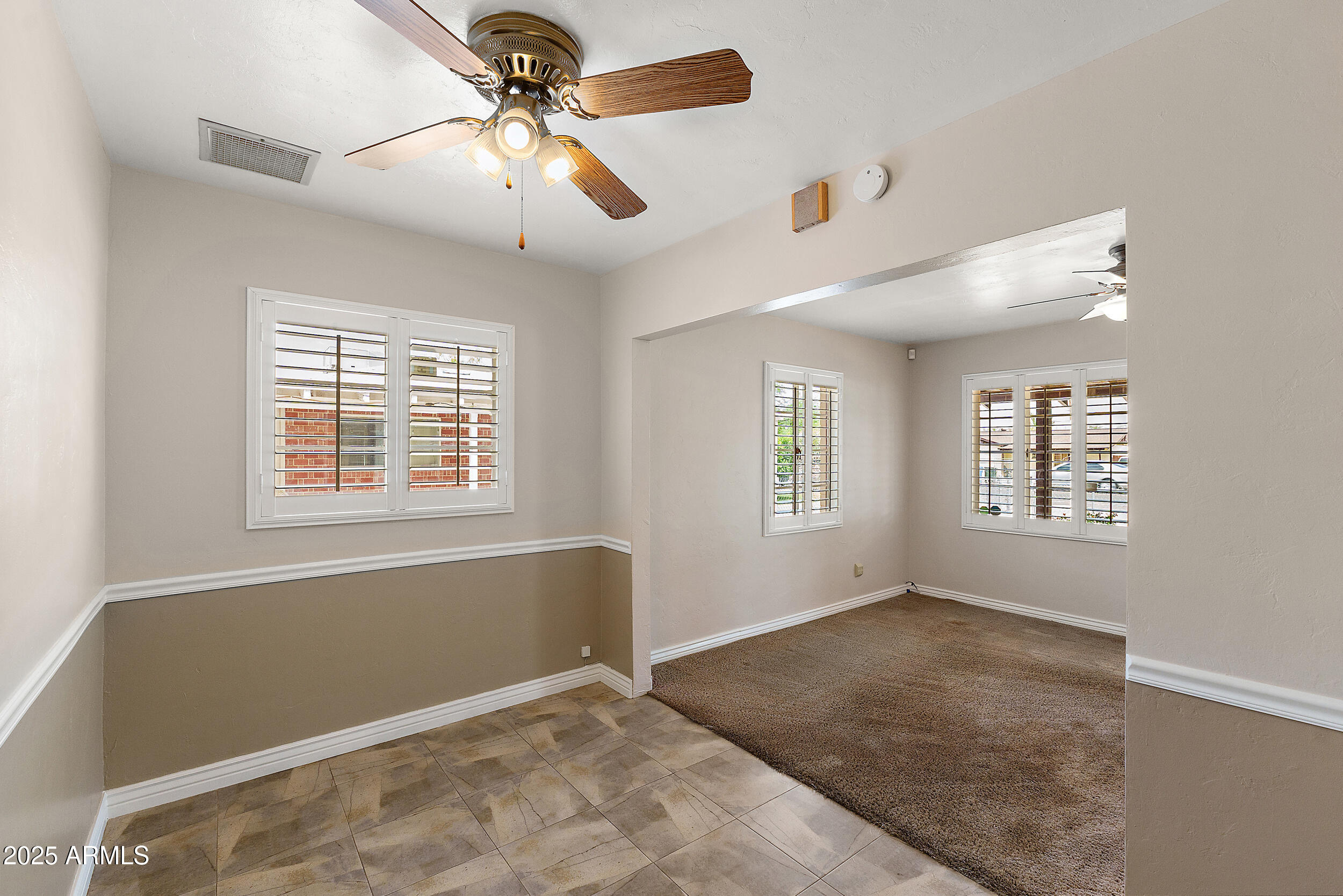 107 West Roeser Road Phoenix, AZ 85041 - Photo 7 of 25 Dining Room, Living Room
