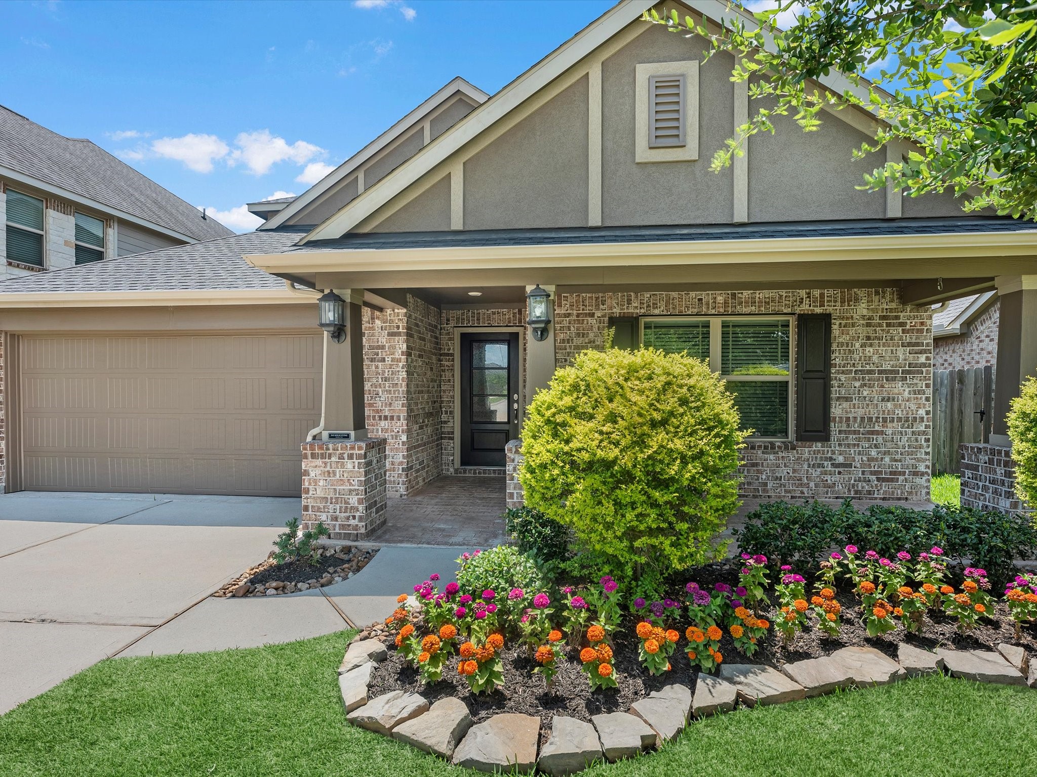 31120 Aspen Gate Trail Spring, TX 77386 - Photo 1 of 33 a front view of a house with a garden