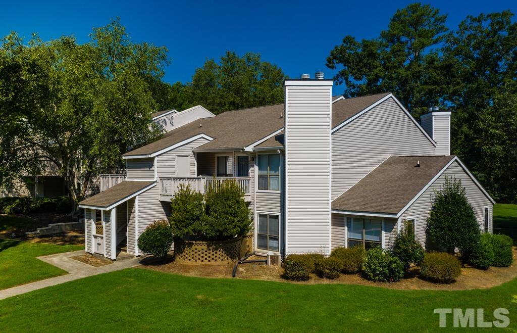 2701 Homestead Road, Unit B1 Chapel Hill, NC 27516 - Photo 2 of 25 a view of a yard in front of house