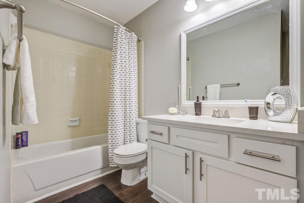 2701 Homestead Road, Unit B1 Chapel Hill, NC 27516 - Photo 17 of 25 a bathroom with a sink a toilet and a bathtub