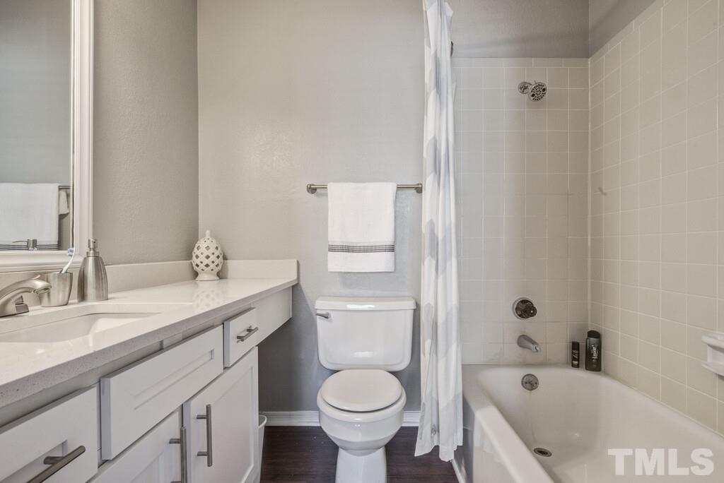 2701 Homestead Road, Unit B1 Chapel Hill, NC 27516 - Photo 18 of 25 a bathroom with a sink toilet and shower
