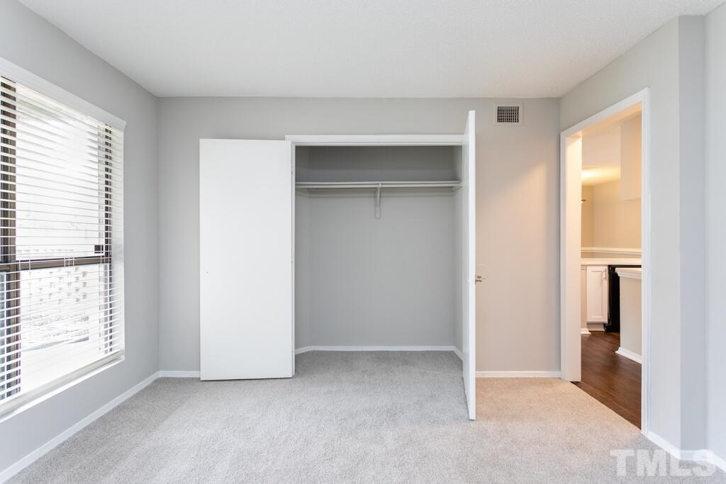2701 Homestead Road, Unit B1 Chapel Hill, NC 27516 - Photo 19 of 25 a view of an empty room with a window