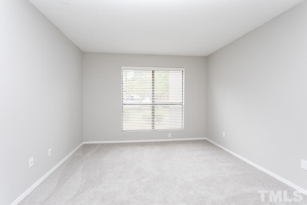 2701 Homestead Road, Unit B1 Chapel Hill, NC 27516 - Photo 20 of 25 an empty room with a window
