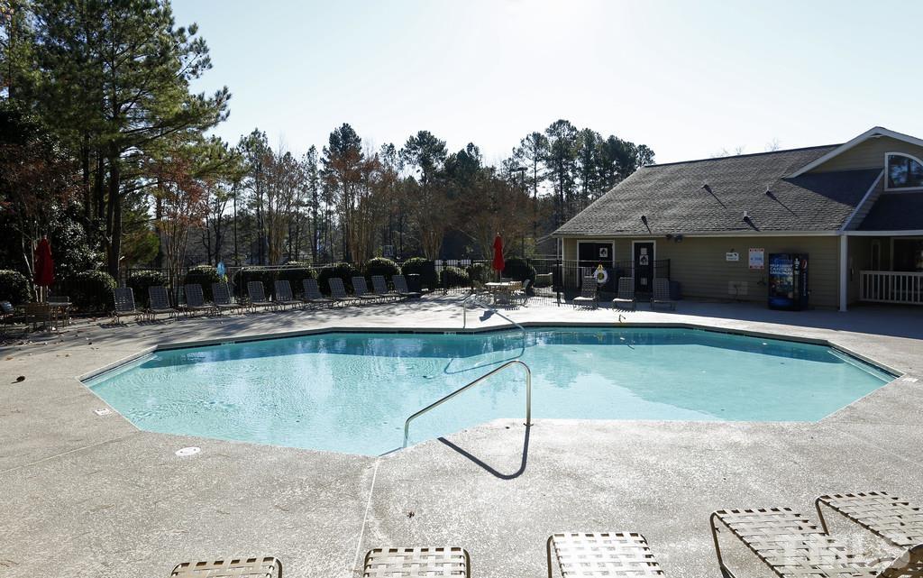 2701 Homestead Road, Unit B1 Chapel Hill, NC 27516 - Photo 22 of 25 a view of a house with swimming pool