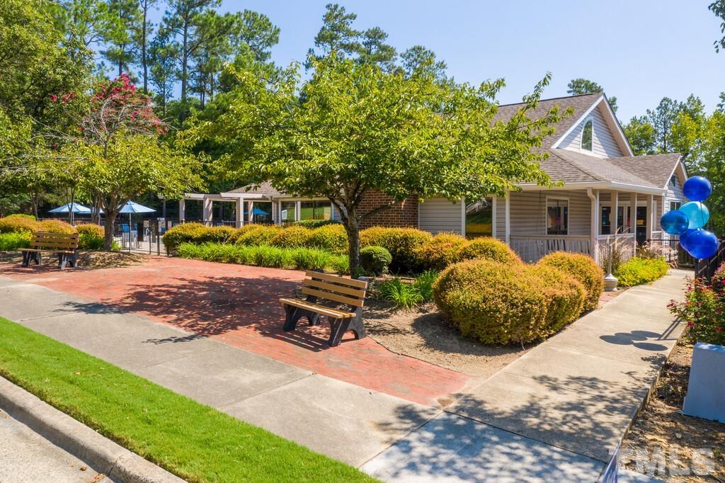 2701 Homestead Road, Unit B1 Chapel Hill, NC 27516 - Photo 5 of 25 a front view of a house with garden