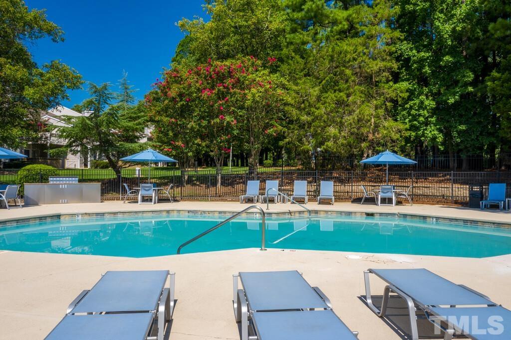 2701 Homestead Road, Unit B1 Chapel Hill, NC 27516 - Photo 6 of 25 a view of a swimming pool with a patio