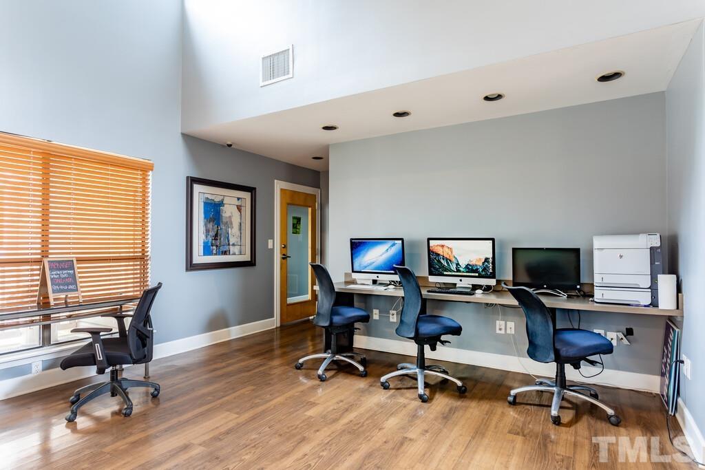 2701 Homestead Road, Unit B1 Chapel Hill, NC 27516 - Photo 9 of 25 a view of a workspace with furniture and a window