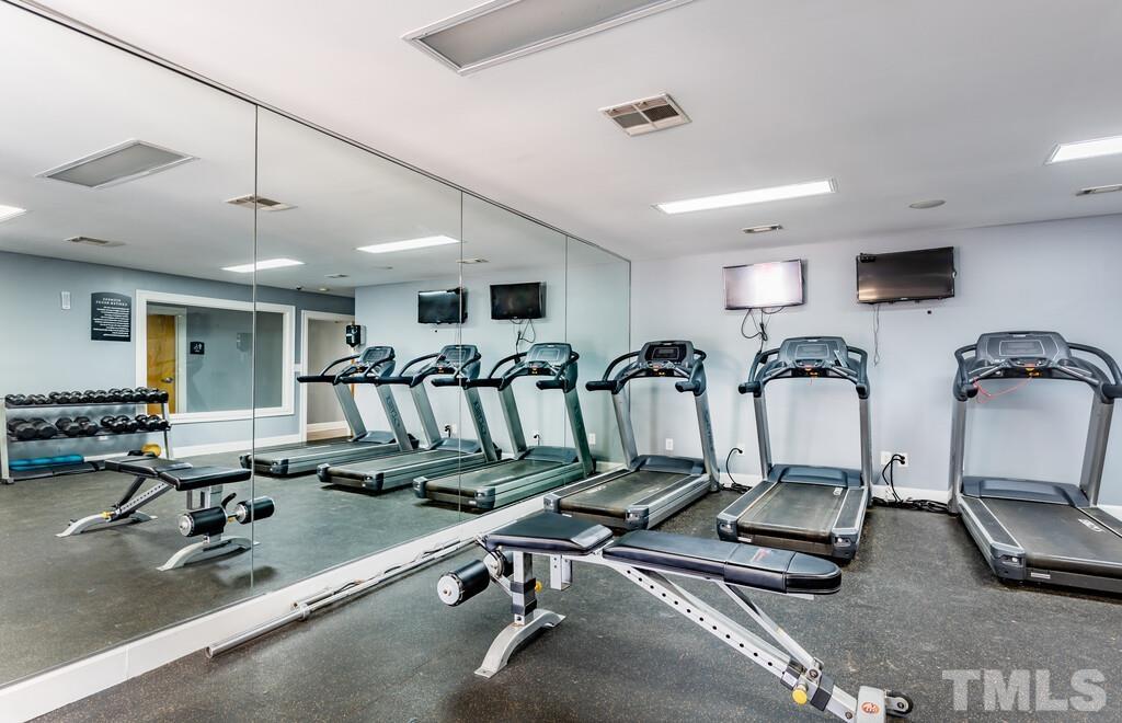 2701 Homestead Road, Unit B1 Chapel Hill, NC 27516 - Photo 10 of 25 a view of a room with gym equipment