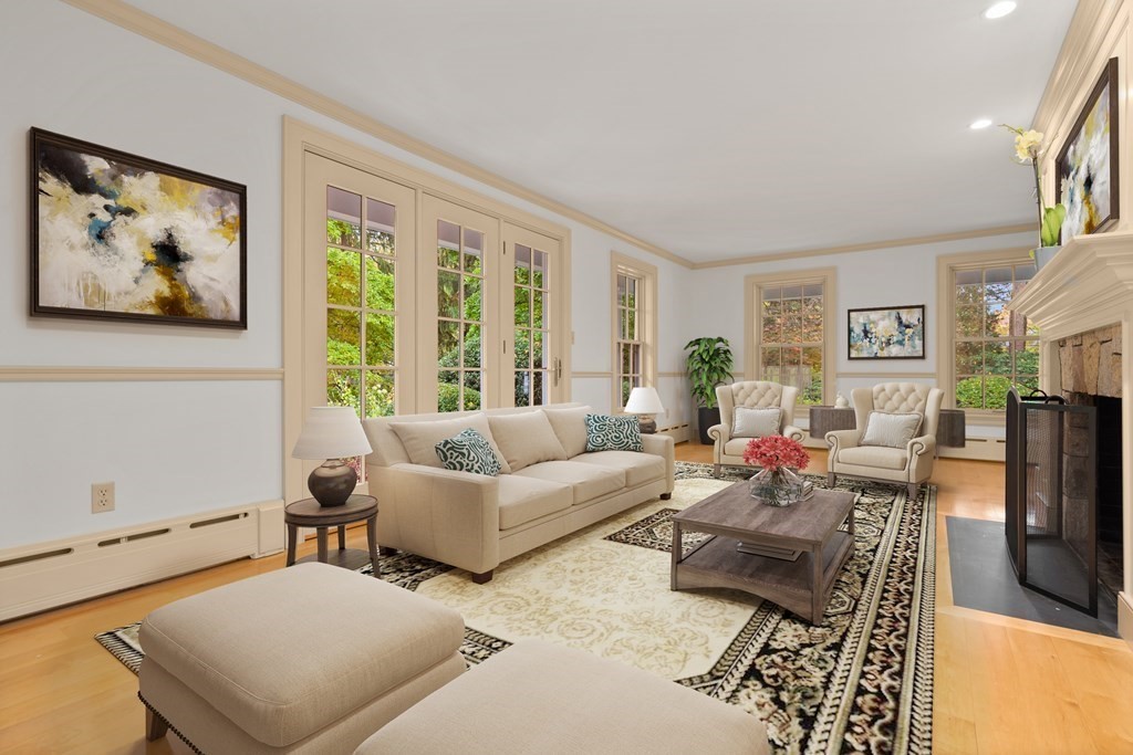 29 Cutler Road Hamilton, MA 01982 - Photo 12 of 42 a living room with furniture large window and flat screen tv