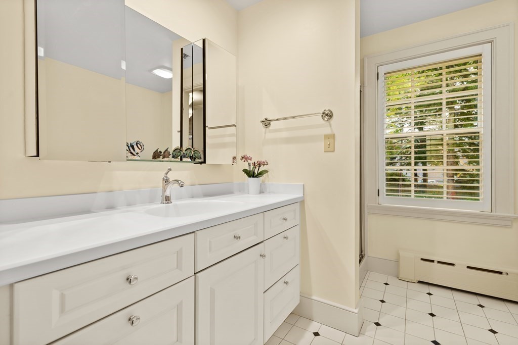 29 Cutler Road Hamilton, MA 01982 - Photo 27 of 42 a bathroom with a sink and a mirror