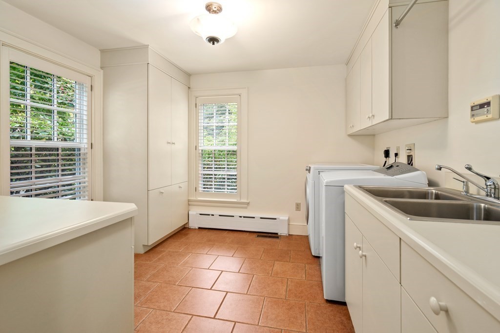 29 Cutler Road Hamilton, MA 01982 - Photo 30 of 42 a kitchen with a sink and cabinets