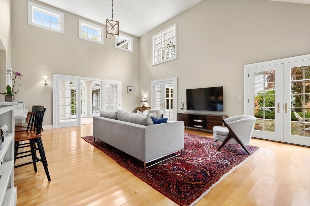 29 Cutler Road Hamilton, MA 01982 - Photo 35 of 42 a living room with furniture and a flat screen tv