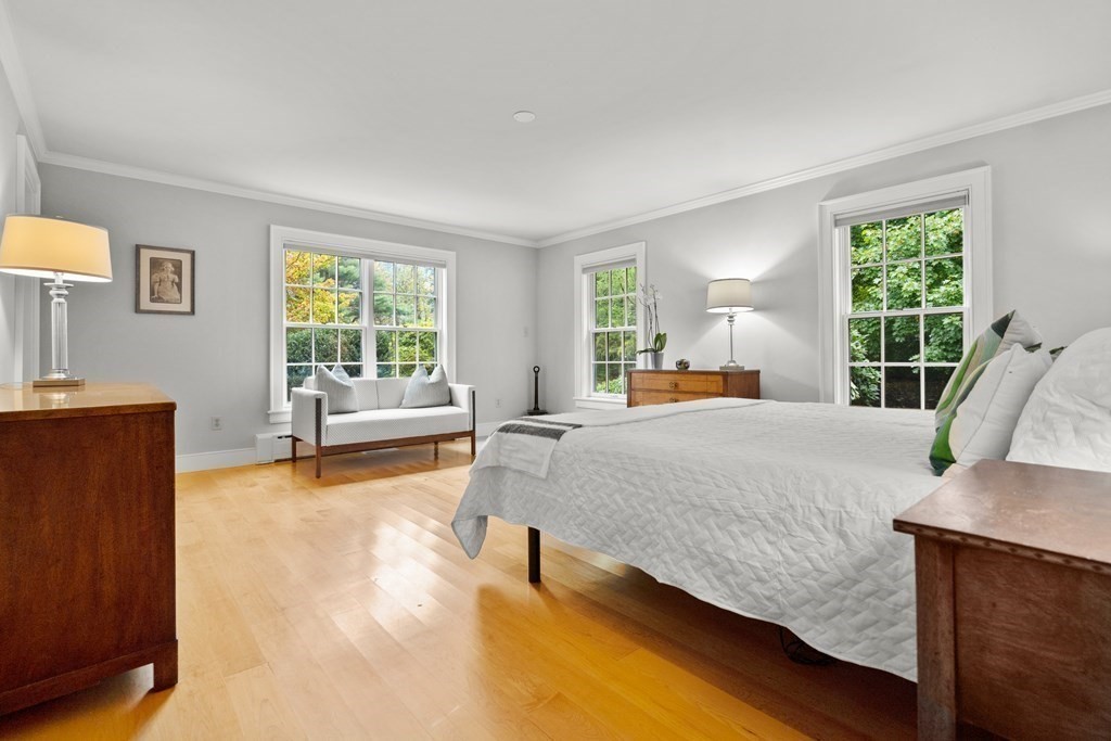 29 Cutler Road Hamilton, MA 01982 - Photo 37 of 42 a bedroom with a large bed and a couch