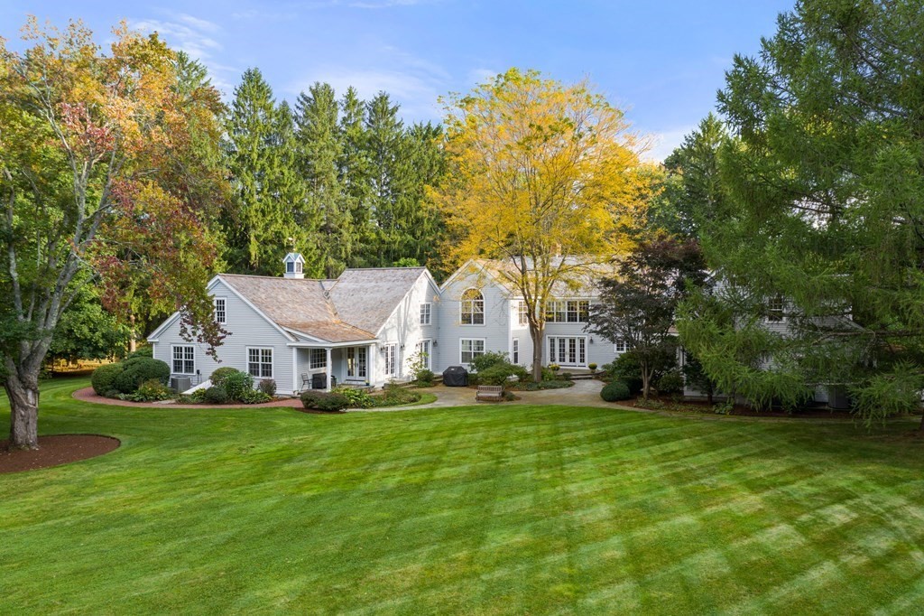 29 Cutler Road Hamilton, MA 01982 - Photo 8 of 42 a front view of a house with a yard